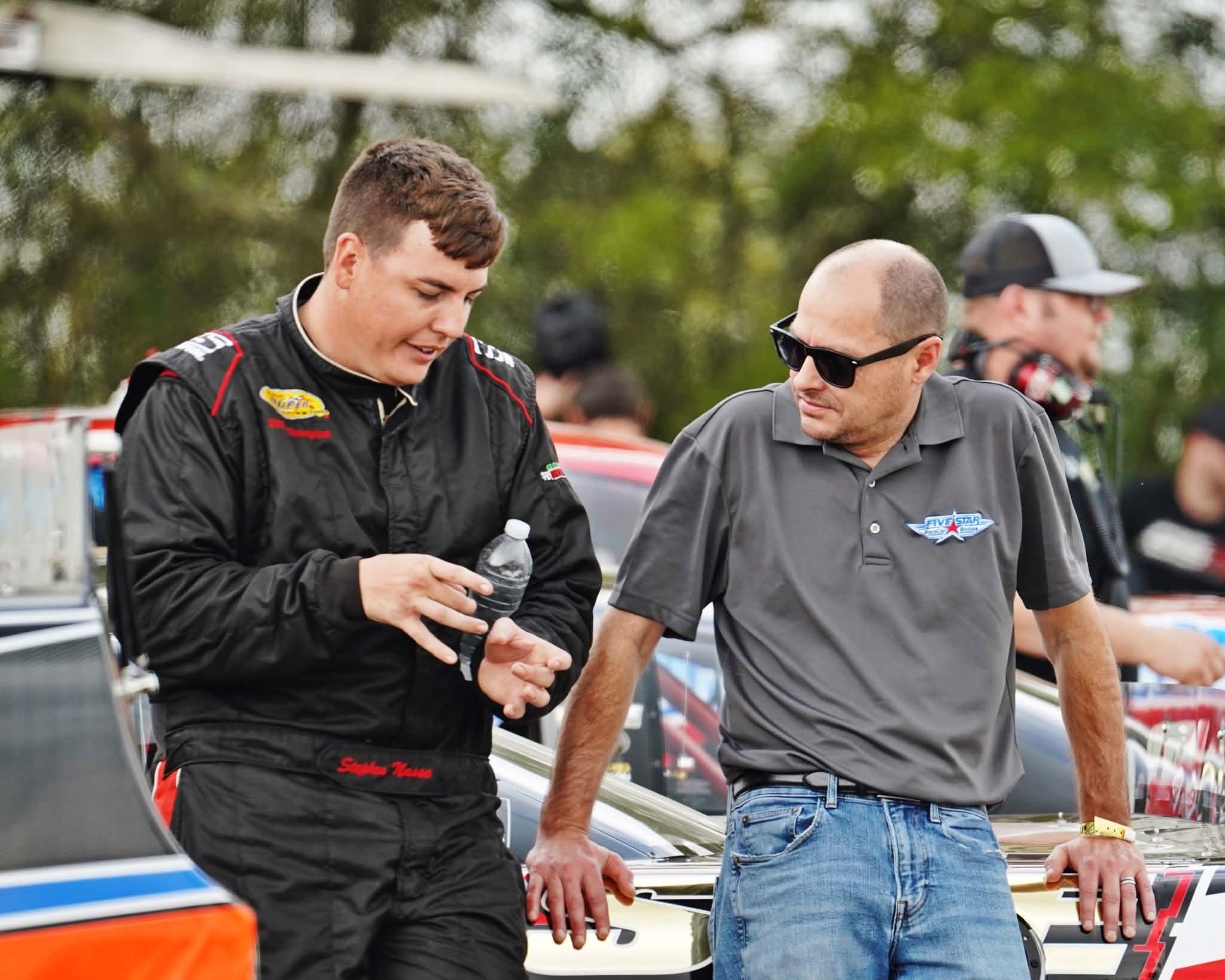 Chris Wiess providing trackside technical support to a Five Star customer