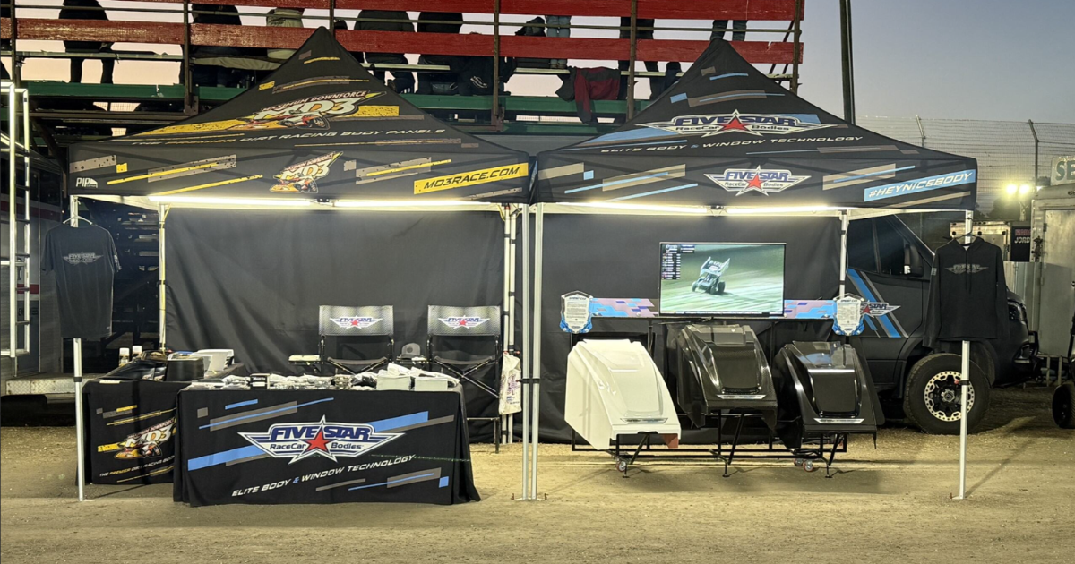 Five Star Road Tour van at dirt racing event