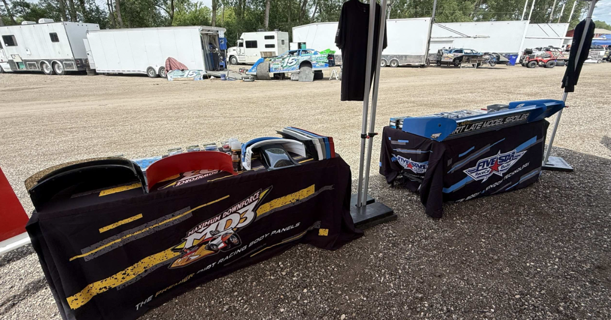 Inside the Five Star Road Tour booth at Wilmot Raceway