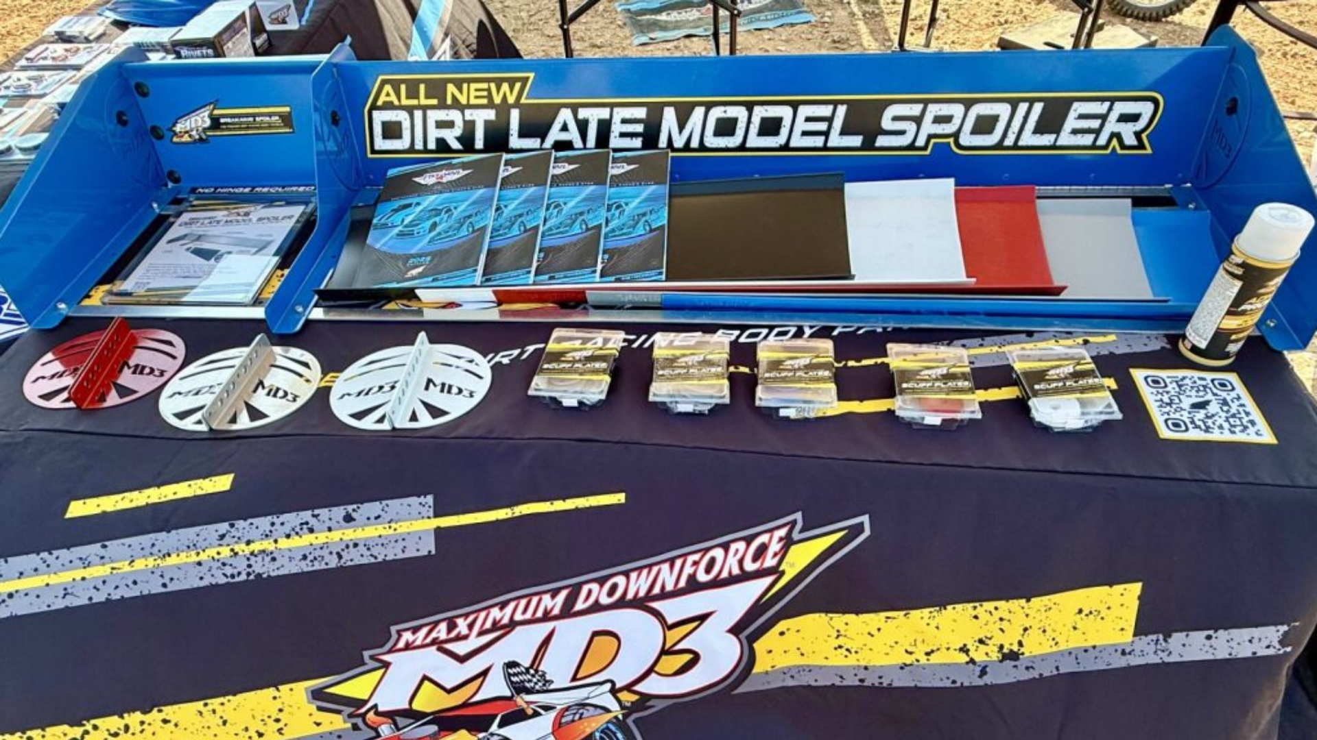 Booth table with MD3 parts and merch